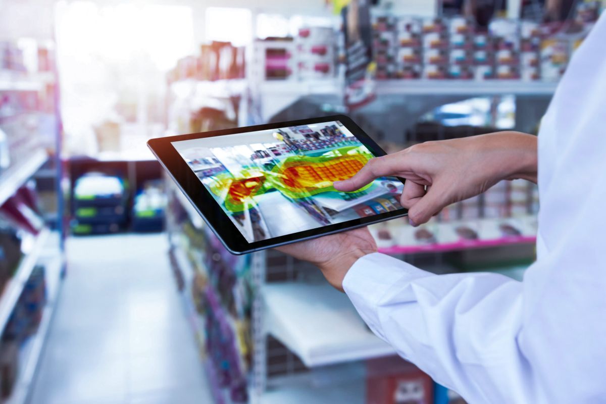 Worker viewing machine performance on a tablet display
