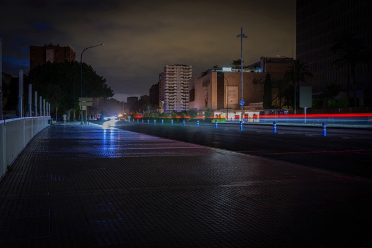 dark road with car lights